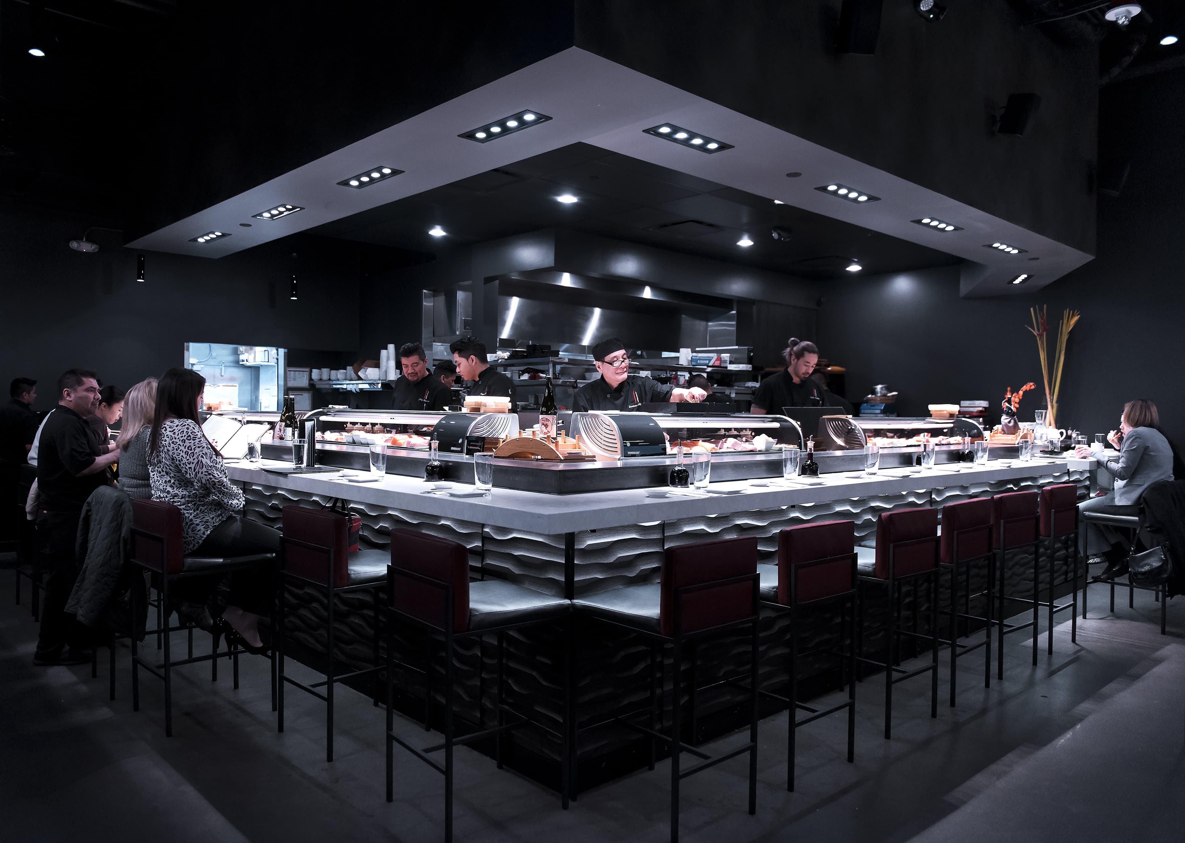 Picture of Japonessa Sushi bar with sushi chefs in the background